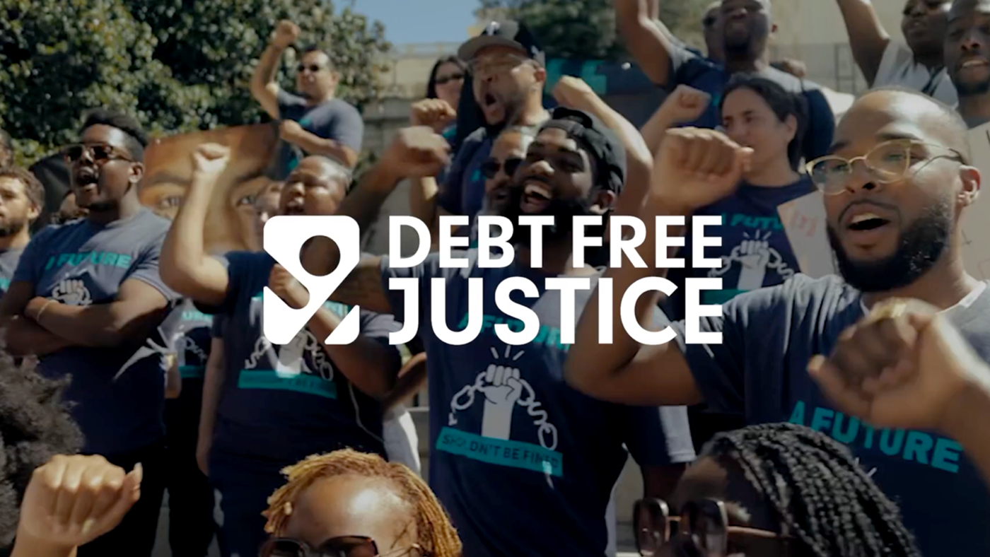 Debt Free Justice supporters in front of the Congress build, image also depicts the DFJ logo overlayed on the featured photography