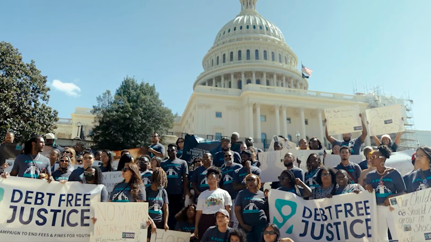 Debt Free Justice supporters gathered outside of Congress in Washing DC